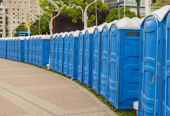 hygienic portable restrooms lined up at a beach party, ensuring guests have access to the necessary facilities while enjoying the sun and sand in Easley